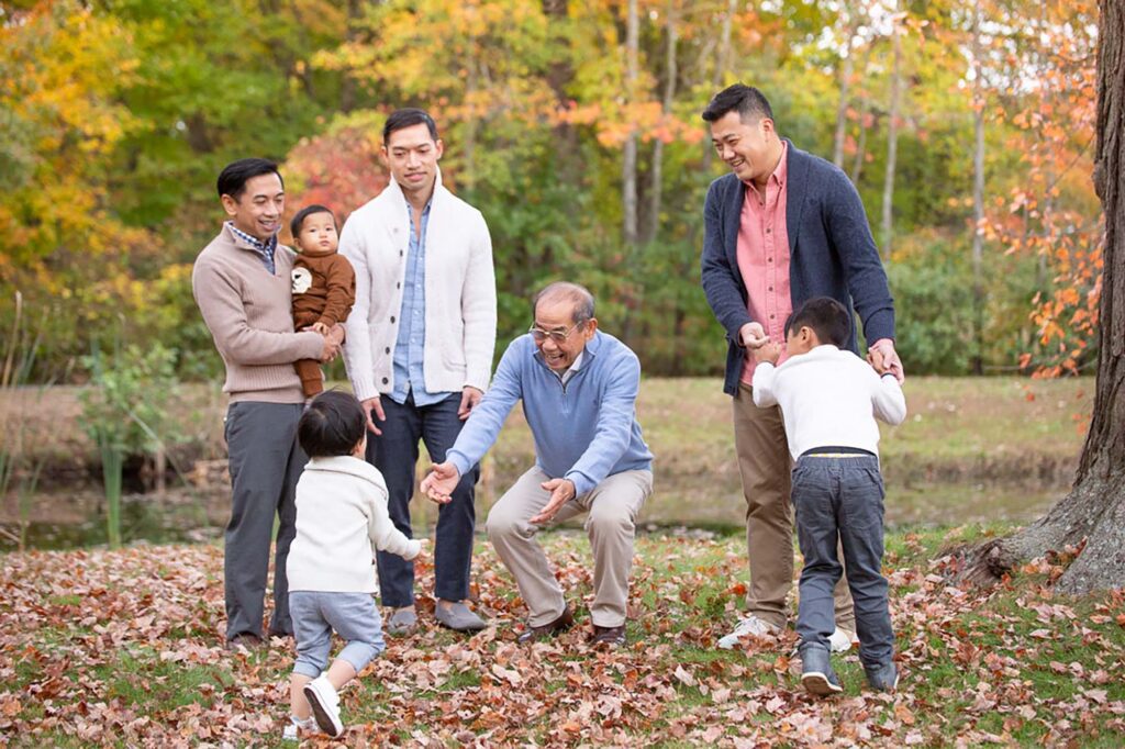 Grandpa has fun at his family party photo session in Connecticut.